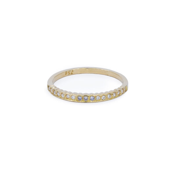 Dainty yellow gold and blue diamond ring